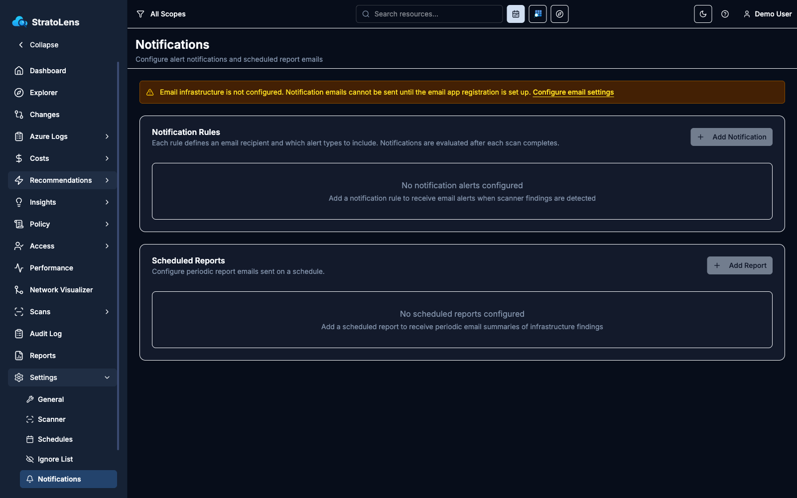 Notifications settings page with the email-not-configured warning banner on top and the Notification Rules and Scheduled Reports cards below